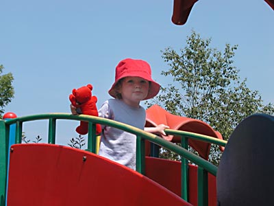 Red hat, red teddy, and red playframe